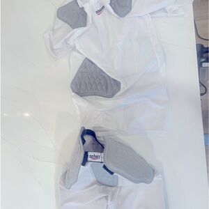 Schutt football girdle and padded compression shirt.